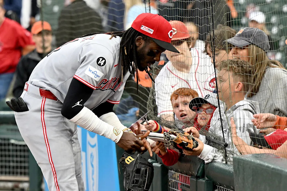 Elly De La Cruz signs autographs for young fans at Javy Baez's home ballpark in Detroit in June.