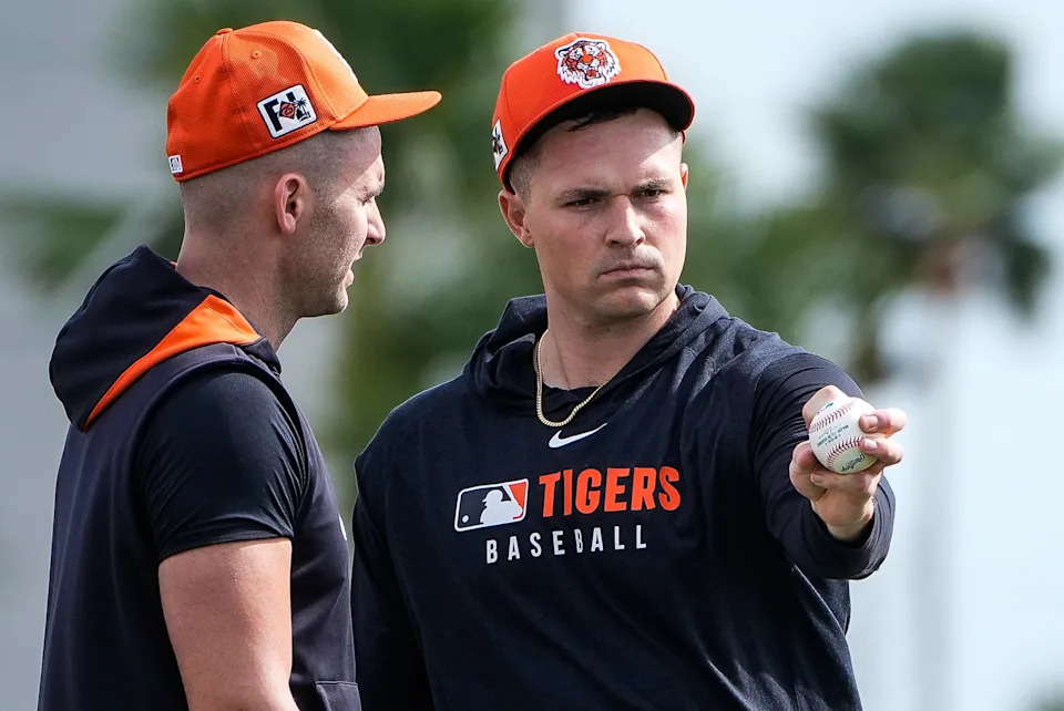 Detroit Tigers pitcher Alex Lange, left, talks to pitcher Tarik Skubal during spring training at TigerTown in Lakeland, Fla. on Sunday, Feb. 16, 2025.