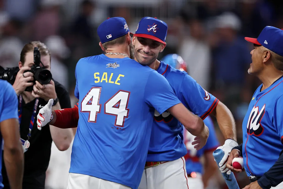 ATLANTA, GEORGIA - JULY 14: Chris Sale #51 and Matt Olson #28 of the Atlanta Braves embrace during the Home Run Derby at Truist Park on July 14, 2025 in Atlanta, Georgia.  (Photo by Jamie Squire/Getty Images)