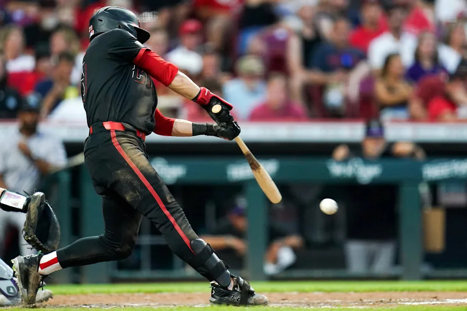 Cincinnati Reds outfielder TJ Friedl (29) hits a RBI in the seventh inning of a MLB game between the Cincinnati Reds and Colorado Rockies, Friday, July 11, 2025, at Great American Ball Park in Downtown Cincinnati. Rockies won 3-2.