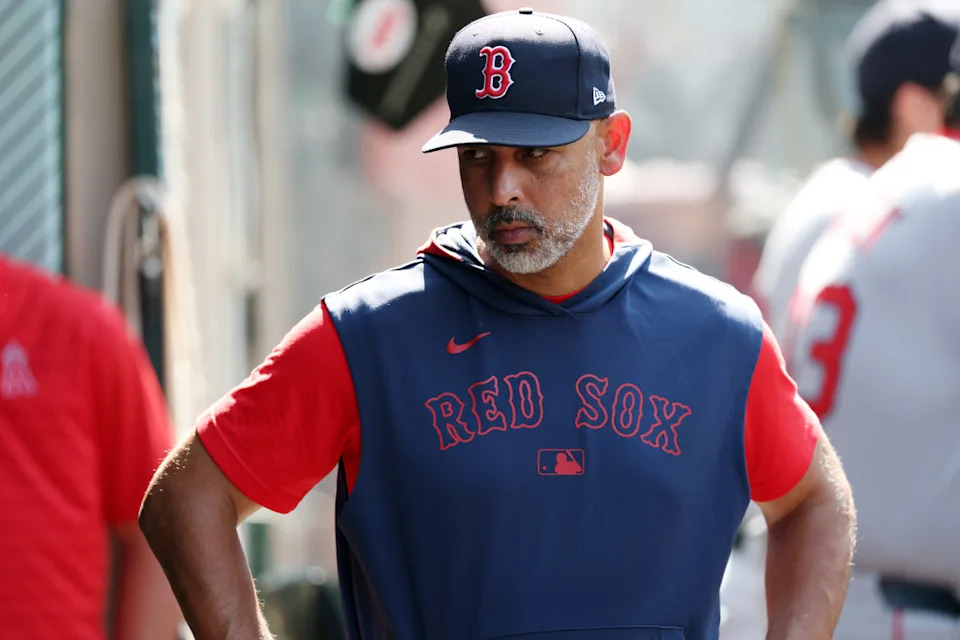 Boston Red Sox manager Alex Cora (13) looks down in the dugout during the eighth inning against the Los Angeles Angels at Angel Stadium.Kiyoshi Mio-Imagn Images