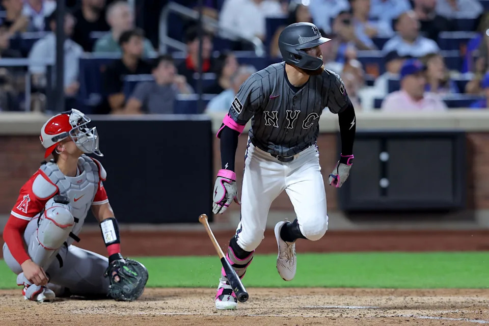 New York Mets left fielder Brandon Nimmo (9) follows through on an RBI single against the Los Angeles Angels during the fifth inning on July 22, 2025, at Citi Field.