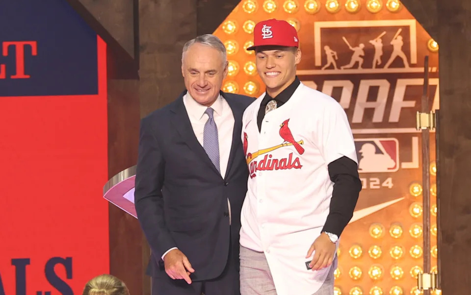 St. Louis Cardinals No. 1 prospect stands with MLB Commissioner Rob Manfred after being selected 7th overall in the 2024 MLB Draft. Kevin Jairaj-Imagn Images