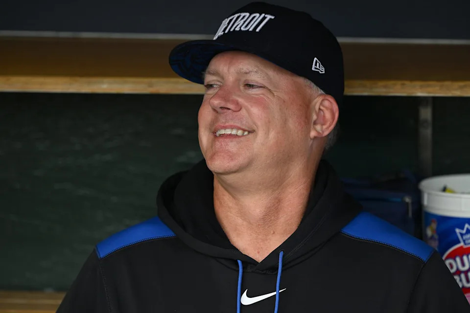 Detroit Tigers manager A.J. Hinch (14) jokes around with his players in the dugout before their game against the Seattle Mariners at Comerica Park in Detroit on Friday, July 11, 2025.
