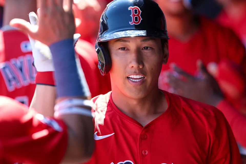 Boston Red Sox outfielder Masataka Yoshida (7) celebrates after hitting a two-run home run against the New York Yankees in the sixth inning during spring training at George M. Steinbrenner Field.Nathan Ray Seebeck-Imagn Images