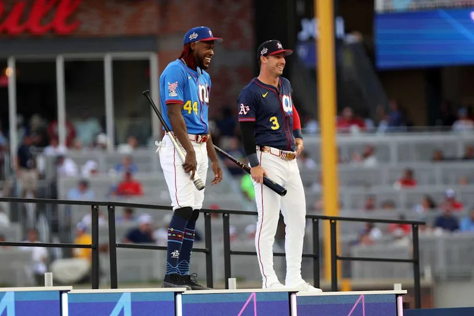 Pittsburgh Pirates outfielder Oneil Cruz (15) and Athletics designated hitter Brent Rooker (25) share the field during the 2025 Home Run Derby at Truist Park in Atlanta on Monday. Rooker finished fifth in the first round after launching 17 home runs, including one measured at 471 feet.