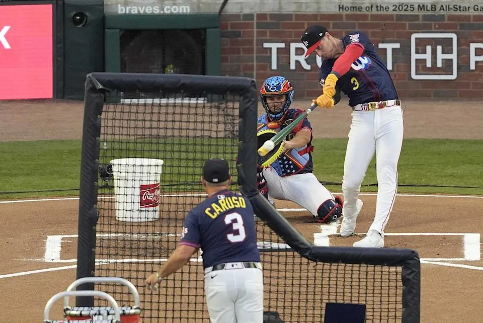 A’s slugger Brent Rooker (25) connects on one of his 17 home runs during Monday’s Home Run Derby at Truist Park in Atlanta. His longest blast traveled 471.53 feet, just shy of the mark needed to advance.