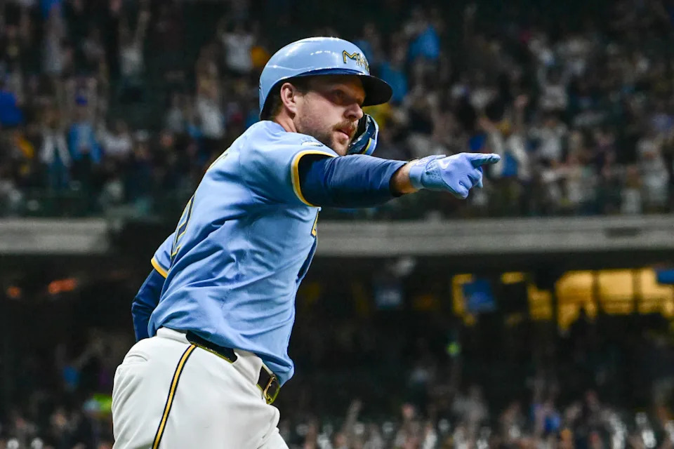 Milwaukee Brewers first baseman Rhys Hoskins (12)Benny Sieu-Imagn Images