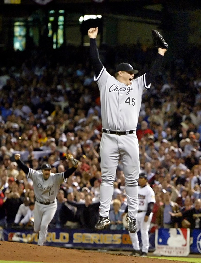 Bobby Jenks and Paul Konerko celebrating a Chicago White Sox World Series win.