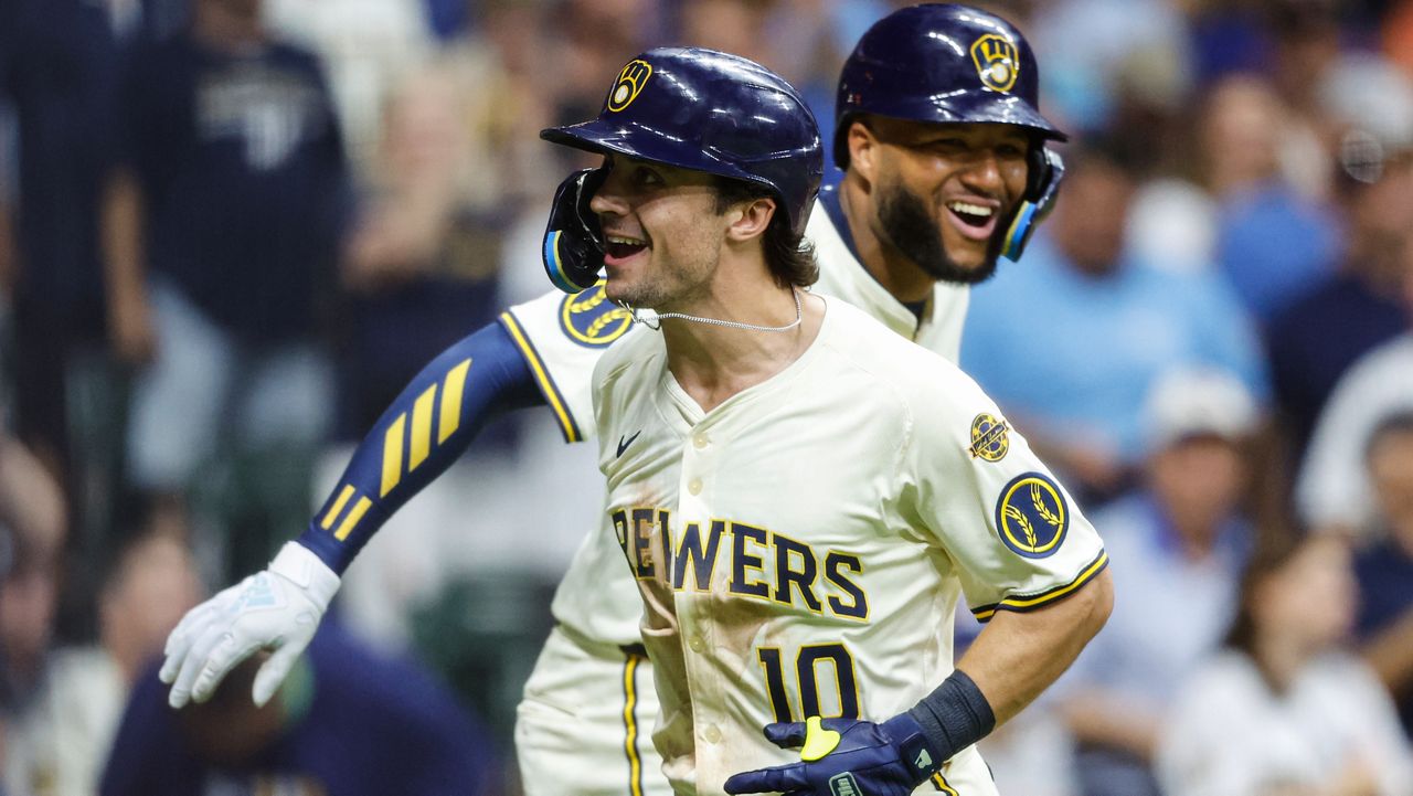 Milwaukee Brewers' Sal Frelick (10) reacts with Jackson Chourio, right, after his home run against the Chicago Cubs during the sixth inning of a baseball game, Monday, July 28, 2025, in Milwaukee.