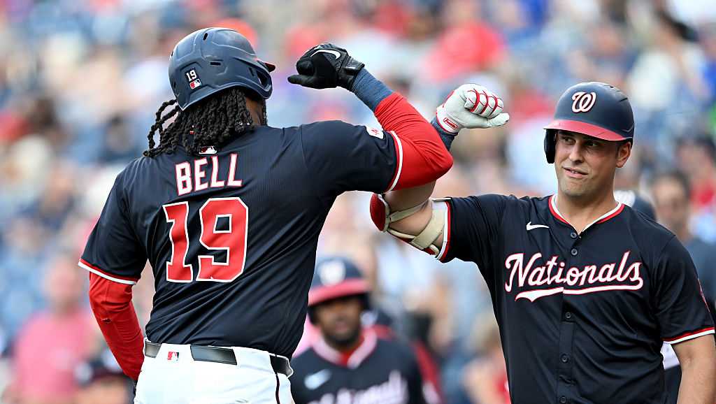 Josh Bell and Daylen Lile lead Nationals in 10-8 win over Reds