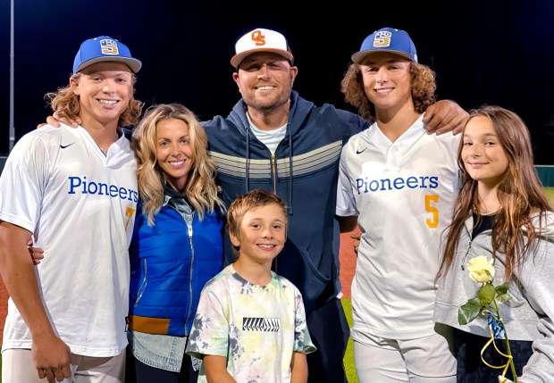 Oklahoma State University volunteer baseball coach Matt Holliday and his family at a Stillwater High School game. Pictured from left is Jackson, Matt's wife Leslee, Reed, Ethan and Gracyn. 