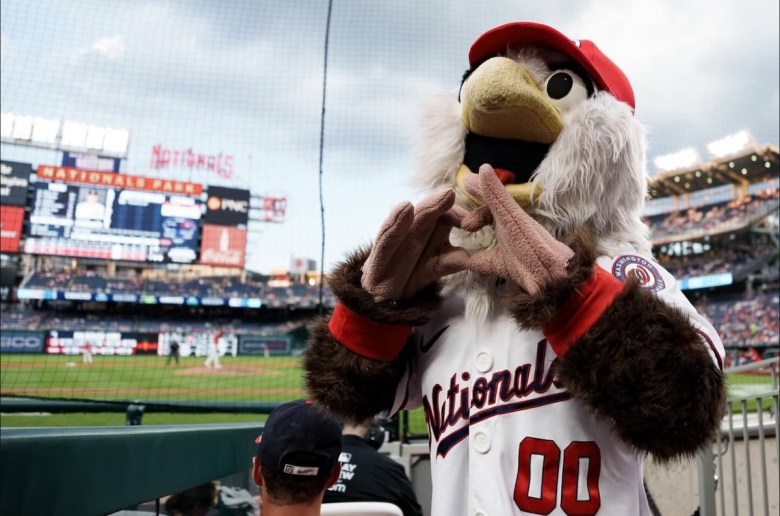 The Washington Nationals mascot, Screech the Eagle, makes heart hands at fans after the Nationals' 9-4 win against the Detroit Tigers on July 3, 2025. (Marcus Relacion/The Washington Informer)