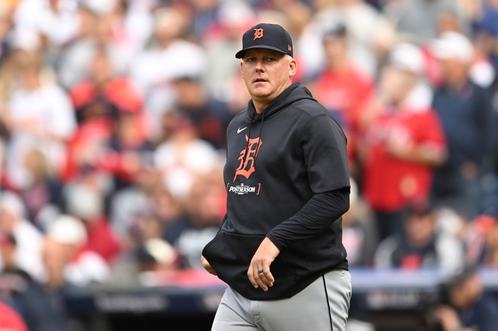 A.J. Hinch #14 of the Detroit Tigers walks to the pitching mound during the eighth inning against the Cleveland Guardians during Game Five of the Division Series at Progressive Field on October 12, 2024 in Cleveland, Ohio. 