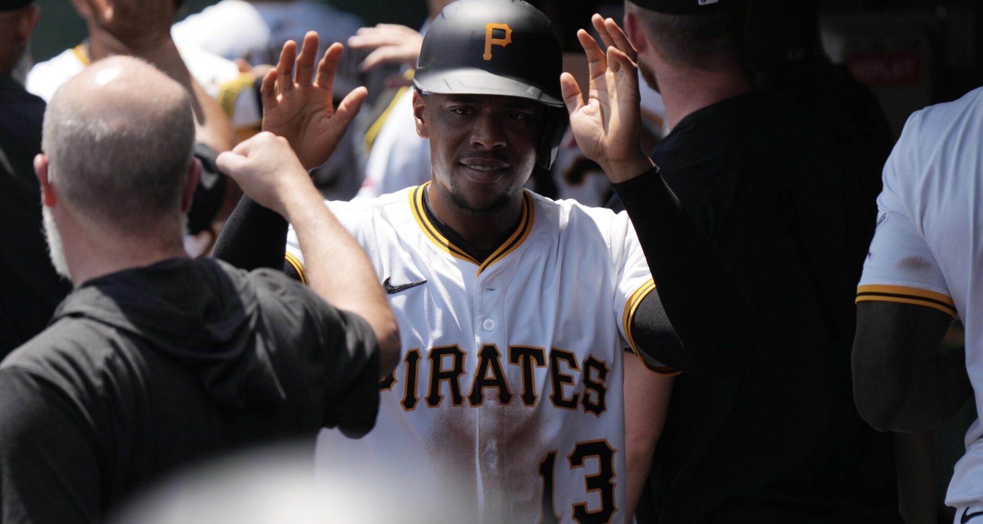 Pirates' Ke'Bryan Hayes beating both his back, bat