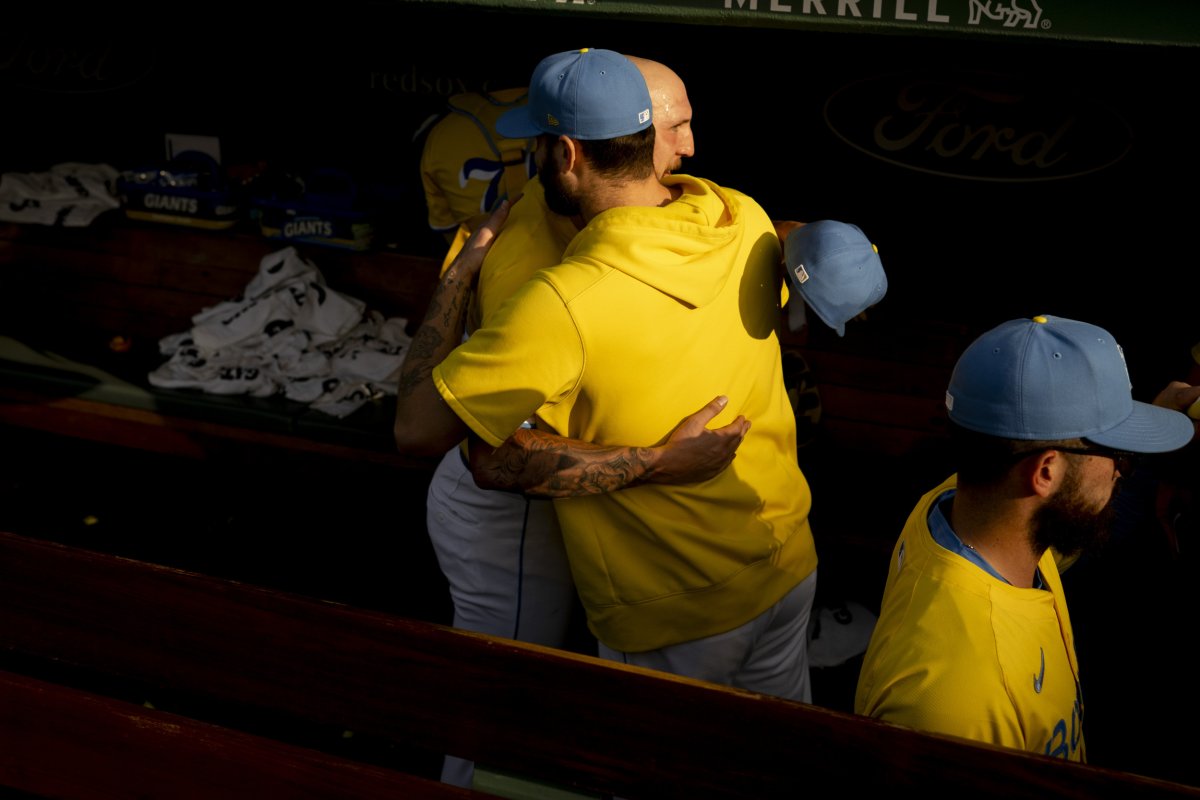 Lucas Giolito Garrett Crochet hug