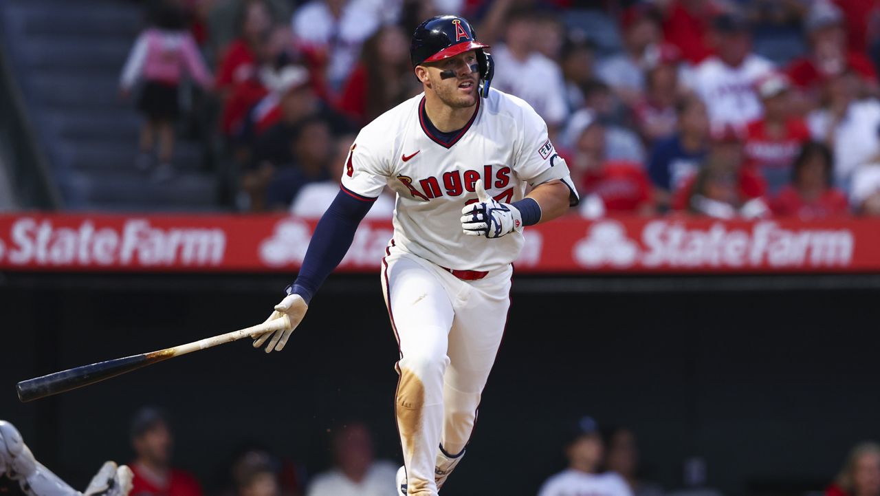 Los Angeles Angels designated hitter Mike Trout drops his bat after hitting a home run during the fifth inning of a baseball game against the Arizona Diamondbacks in Anaheim, Calif., Saturday, July 12, 2025. (AP Photo/Jessie Alcheh)