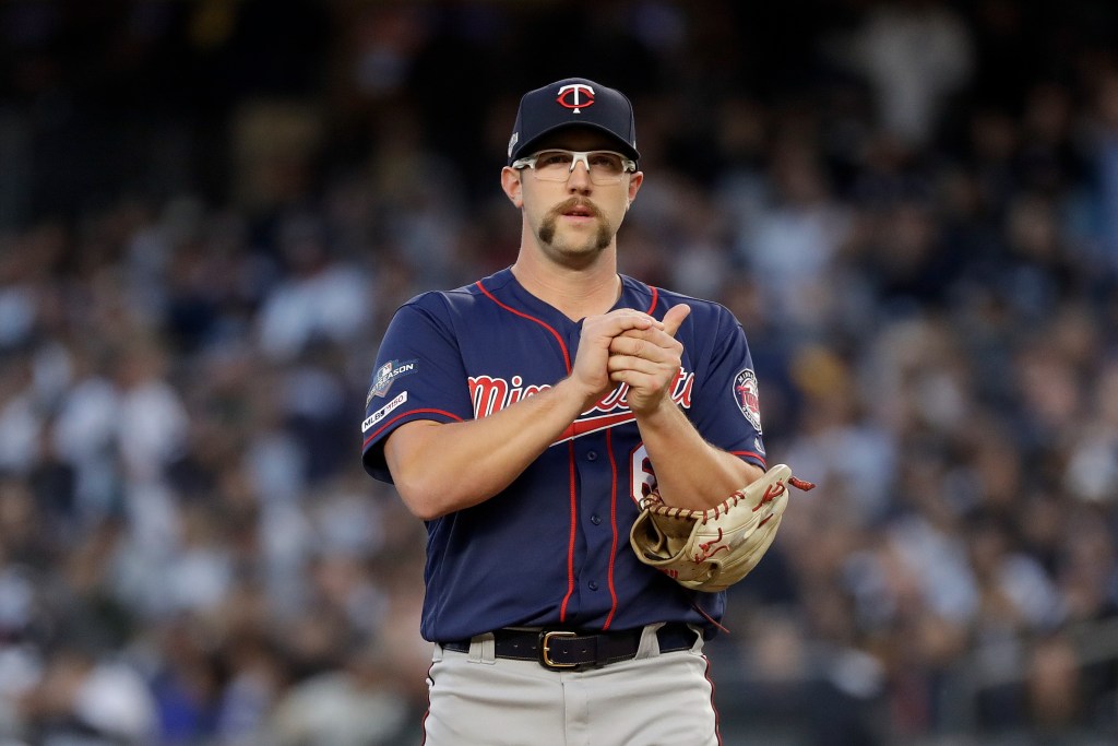 Minnesota Twins pitcher Randy Dobnak pauses between batters after walking New York Yankees' Brett Gardner during the third inning of Game 2 of an American League Division Series baseball game, Saturday, Oct. 5, 2019, in New York. 