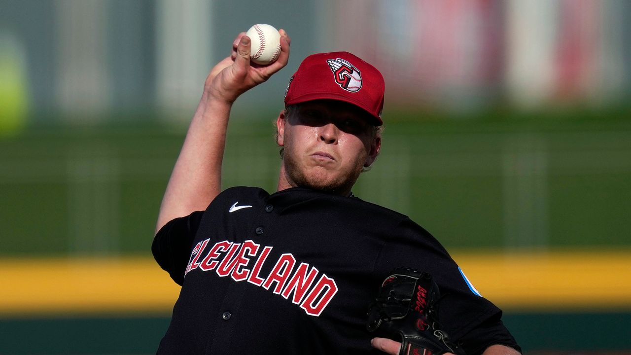 Cleveland Guardians pitcher Nic Enright throws in the ninth inning of a spring training baseball game against the Oakland Athletics, Tuesday, Feb. 27, 2024, in Goodyear, Ariz. (AP Photo/Carolyn Kaster, File)