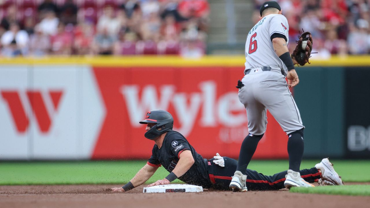 Cincinnati Reds' Spencer Steer slides into second base after advancing on a balk during the second inning of a baseball game against the Arizona Diamondbacks, Friday, June 6, 2025, in Cincinnati.
