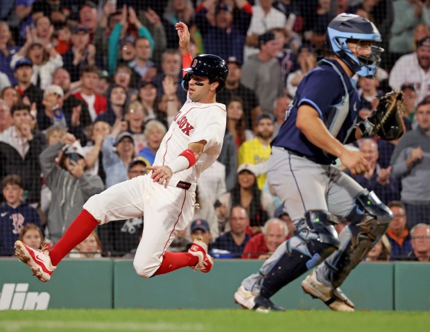 Boston , MA - July 10 - Marcelo Mayer (39) of the Boston Red Sox scores during the seventh inning of a MLB game against the Tampa Bay Rays at Fenway Park. (Photo By Matt Stone/Boston Herald)