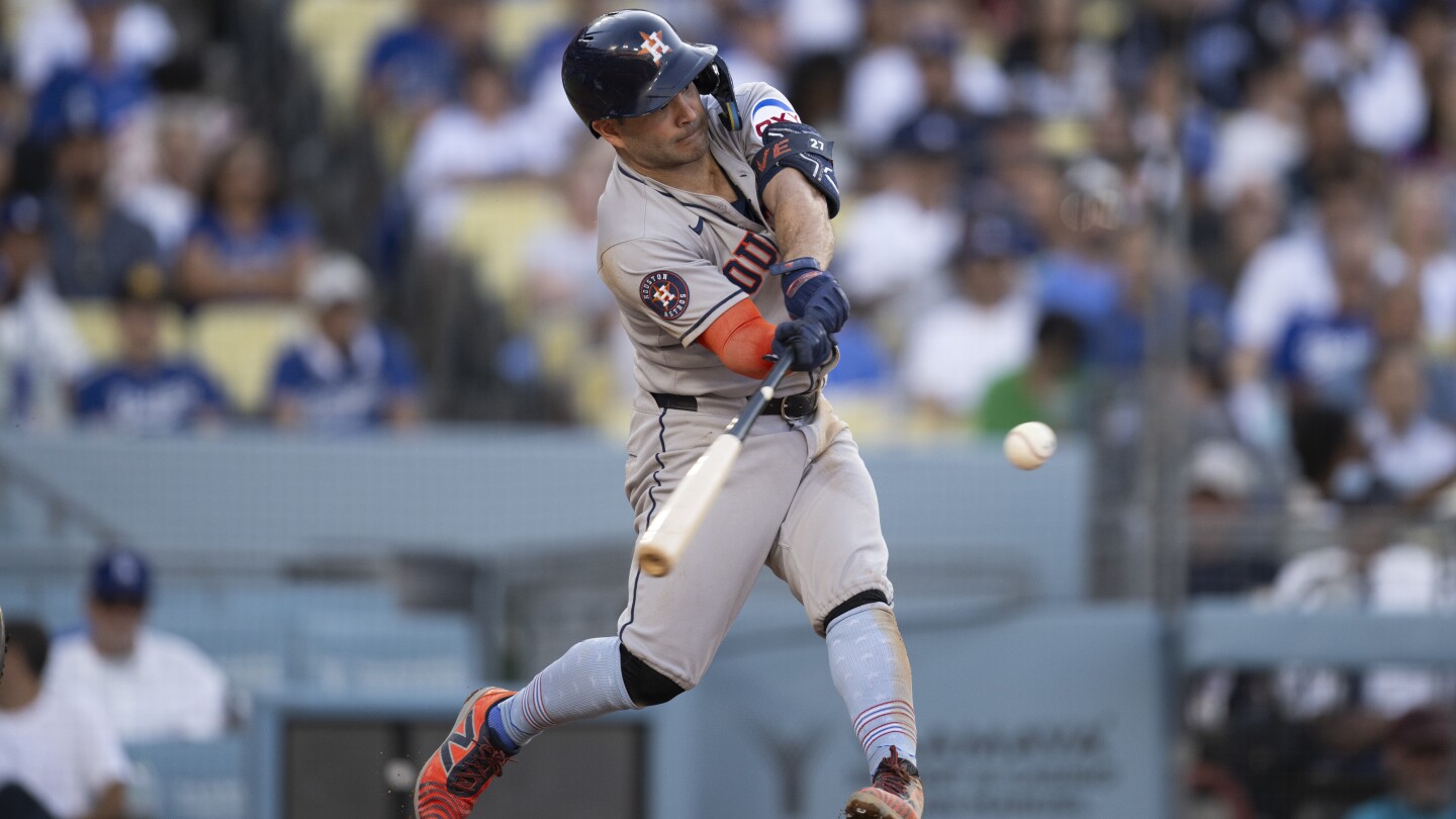 Astros' Altuve homers twice, drives in five and gets booed in 18-1 historic rout of Dodgers