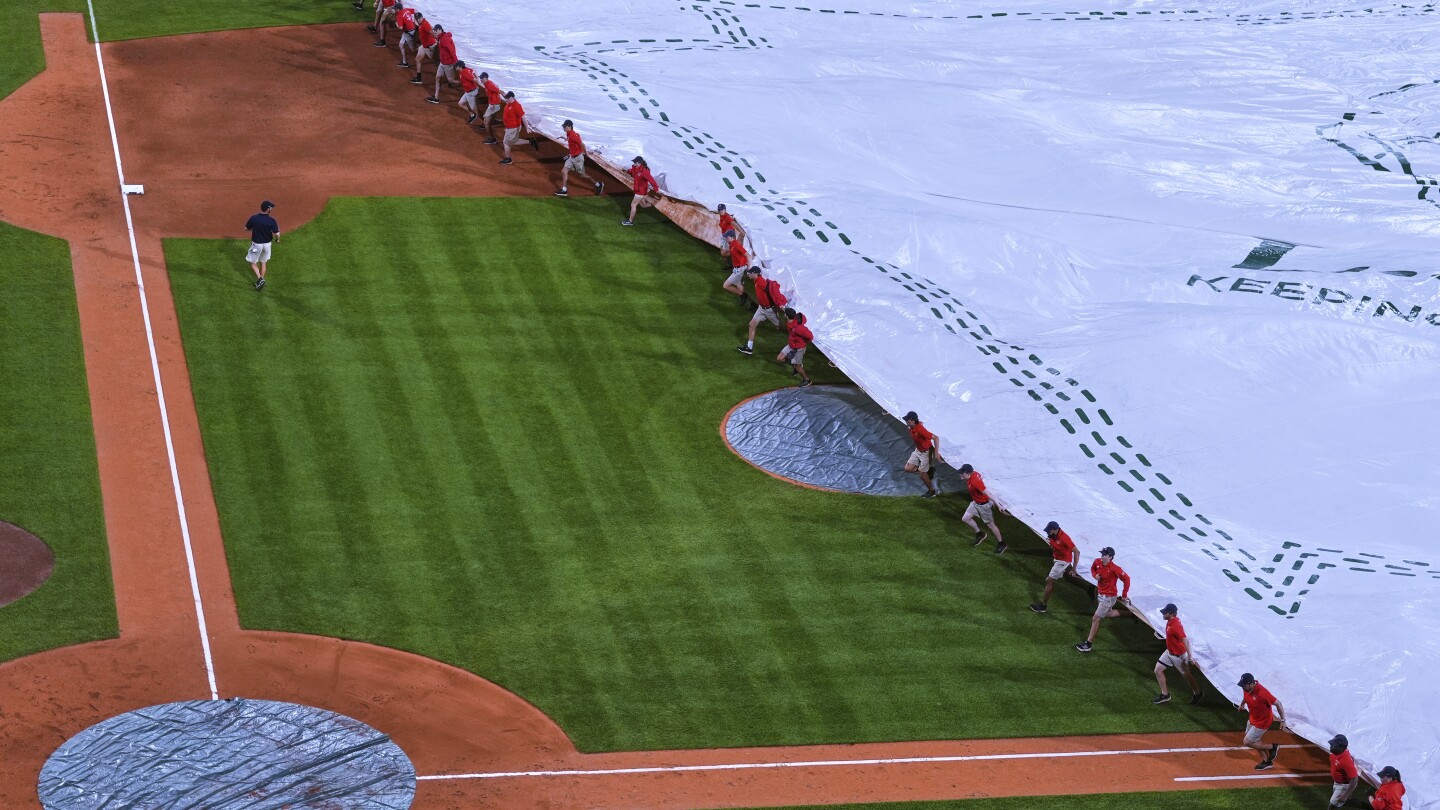 Reds and Red Sox suspended because of rain, will finish as part of day-night doubleheader Wednesday
