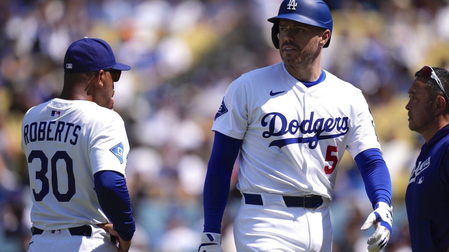Dodgers' Freddie Freeman day to day after being hit on the wrist by a pitch