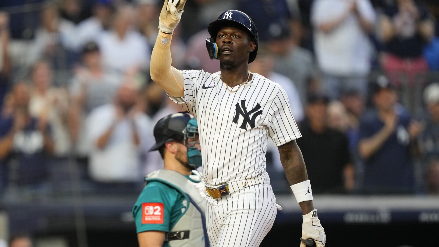 Chisholm homers twice and Schlittler wins MLB debut as Yankees top Mariners 9-6