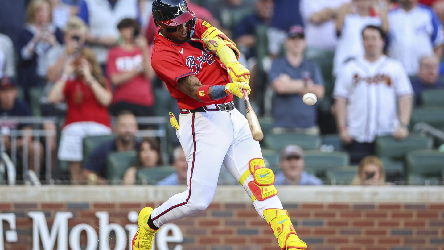Ronald Acuña Jr. hits long homer on first pitch in his return to Braves after missing 1 year