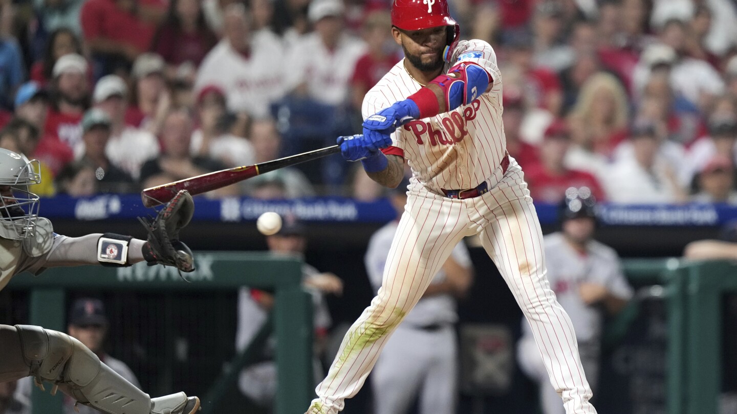 Phillies claim another wild, walk-off win on catcher's interference with bases loaded in 10th