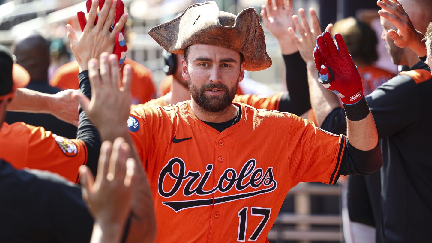 Laureano drives in go-ahead run in 3-run 10th inning as Orioles blast 3 homers and beat Braves 9-6