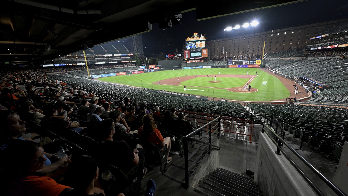 Why did the Orioles and Rockies keep playing after fans evacuated seats?