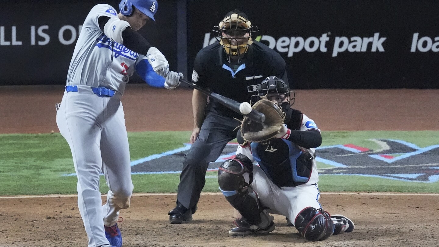 Ohtani has 3 homers, 10 RBIs and becomes first 50-50 player as Dodgers rout Marlins, clinch playoffs