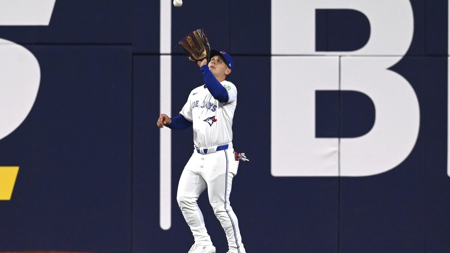 Toronto Gold Glove OF Varsho makes stunning, backhanded catch in season debut against Boston