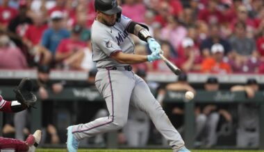 Marlins extend road winning streak to 11 with 12-2 win over Reds