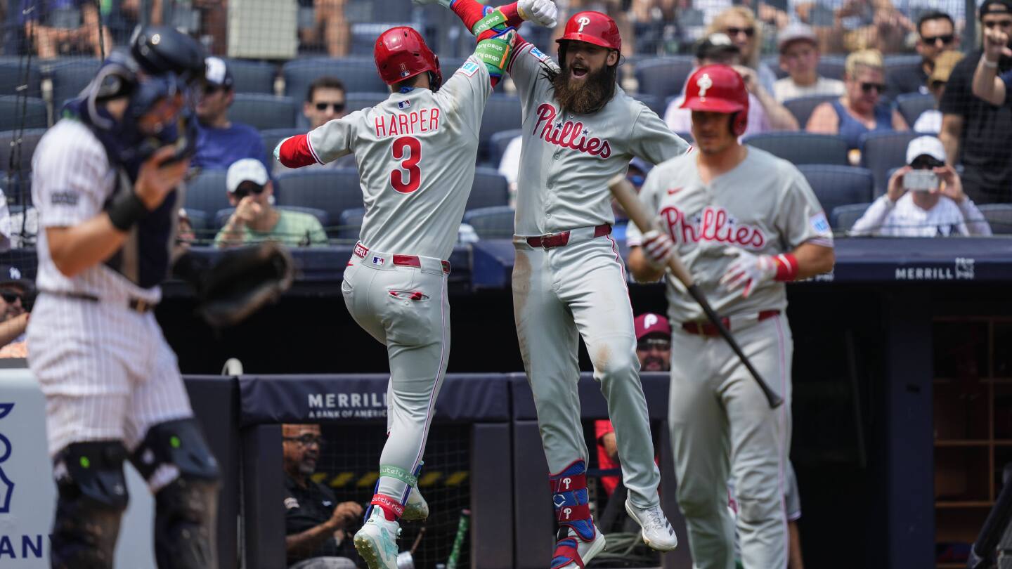 Harper, Schwarber spark Phils over reeling Yanks, who lose Judge to IL
