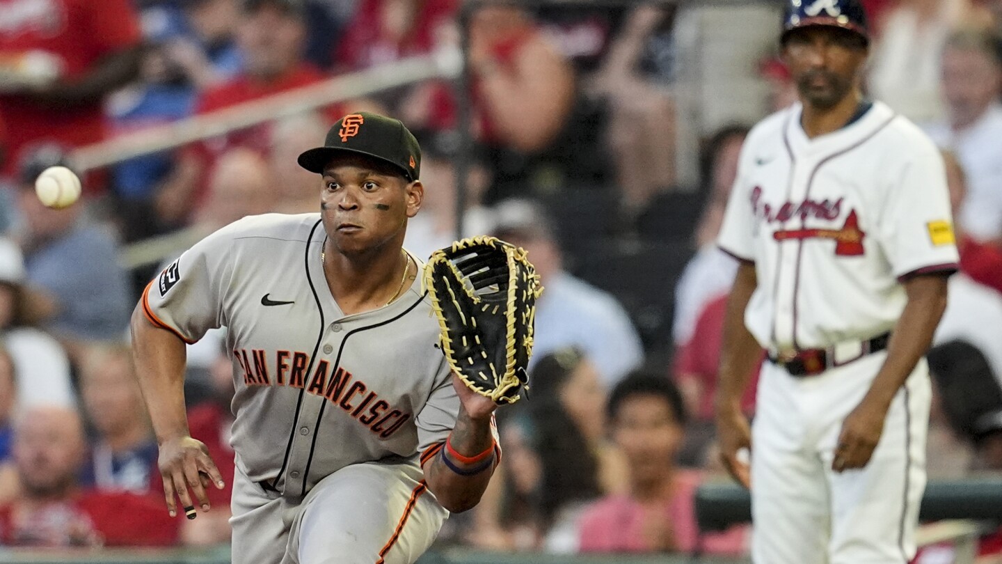 Rafael Devers debuts at first base for the Giants
