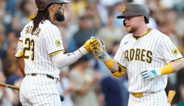 San Diego watches former catcher lead Texas to win