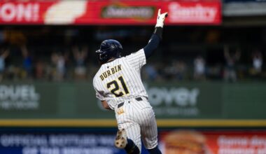 Brewers score three in ninth to win 6-5 in Woodruff’s return to Milwaukee