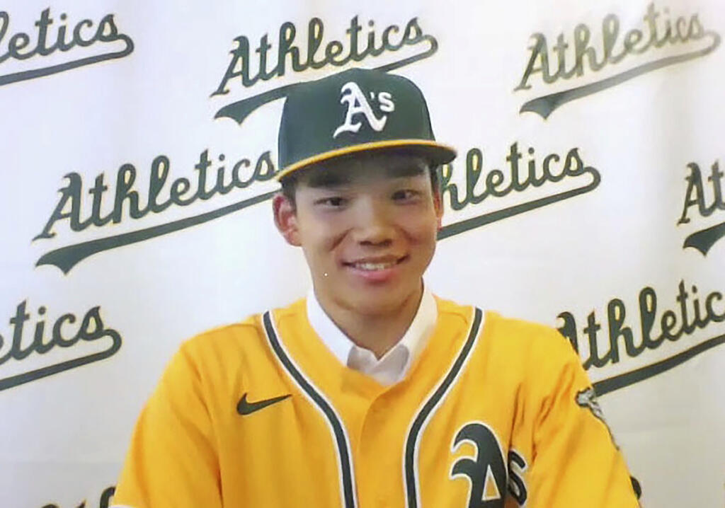 In this image taken from a video, Japanese high school student Shotaro Morii speaks during an online news conference Wednesday, Jan. 15, 2025, as he agreed to a minor league contract with the Athletics. (Kyodo News via AP)