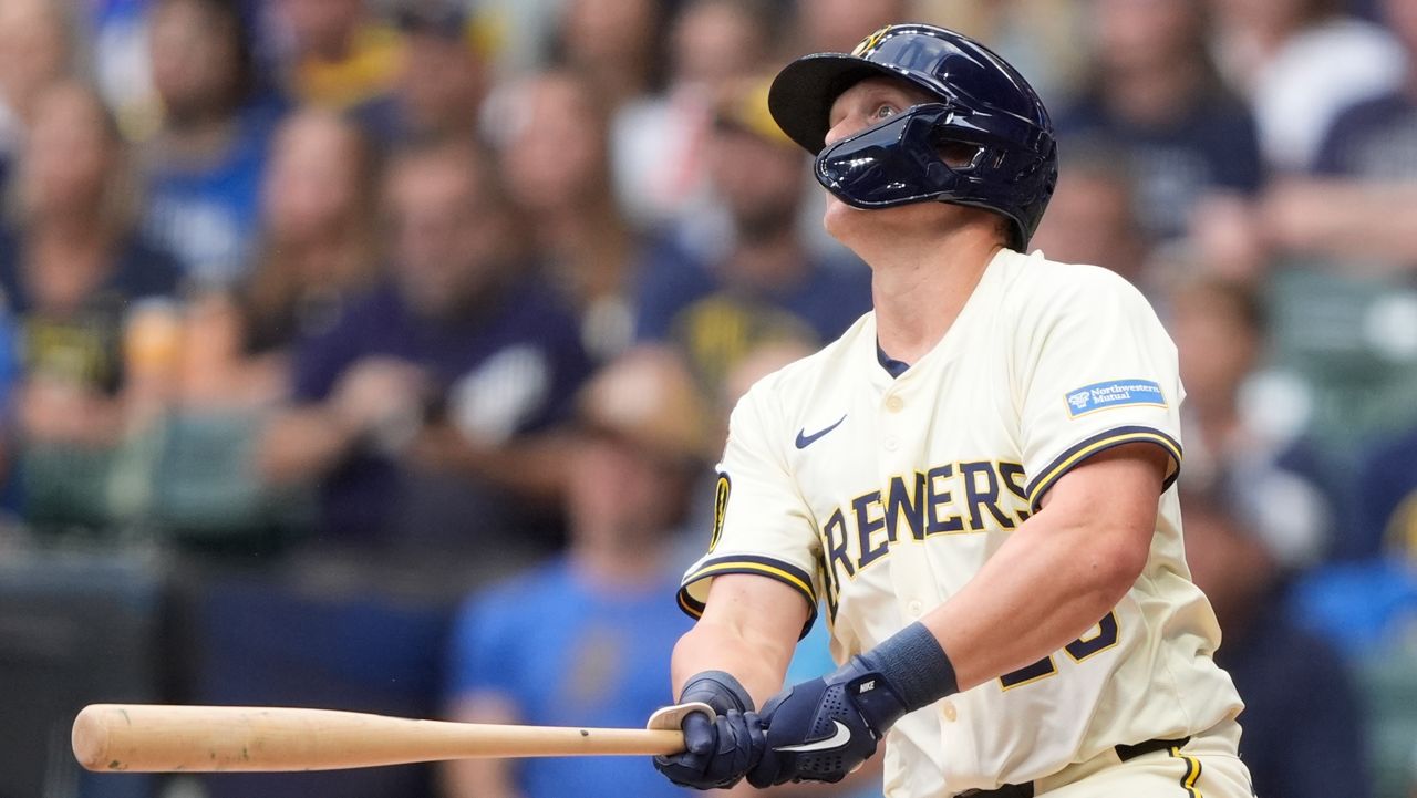 Milwaukee Brewers' Andrew Vaughn hits a three-run home run during the first inning of a baseball game against the Los Angeles Dodgers, Monday, July 7, 2025, in Milwaukee.