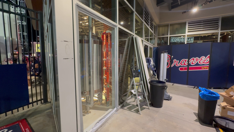 A window near the Chop House at Truist Park was smashed during the MLB Home Run Derby 2025 in Atlanta on July 14, 2025.