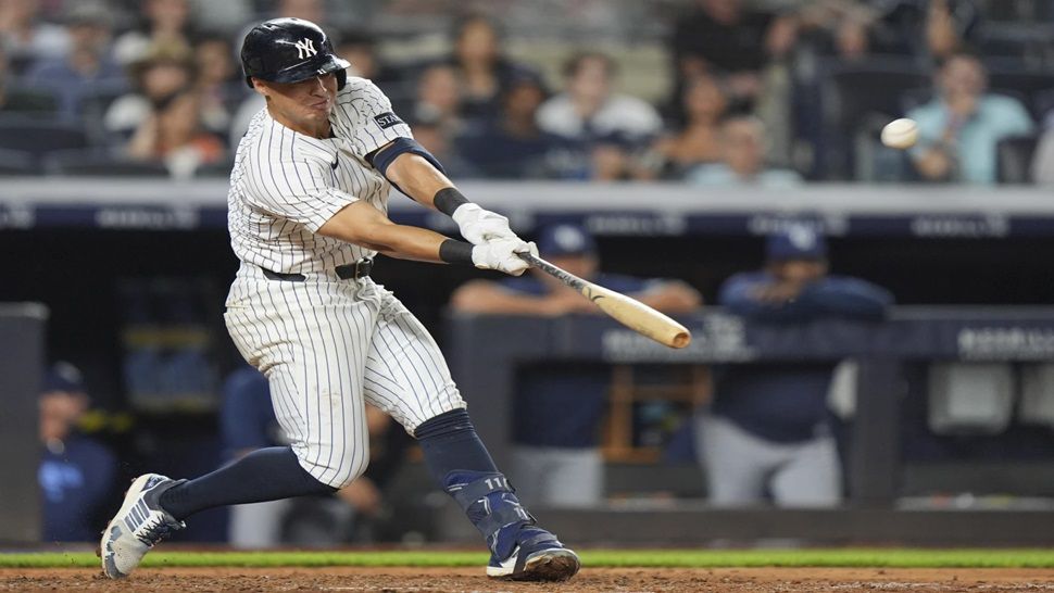 New York Yankees' Anthony Volpe hits a home run during the ninth inning of a baseball game against the Tampa Bay Rays Wednesday, July 30, 2025, in New York. (AP Photo/Frank Franklin II)