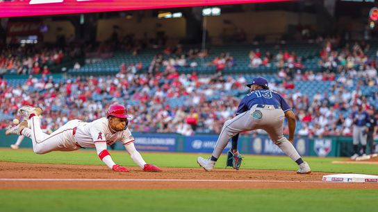 Christian Moore #4 of the Los Angeles Angels slides to third against the Tampa Bay Rays at Angel Stadium of Anaheim on August 4, 2025 in Anaheim, California.