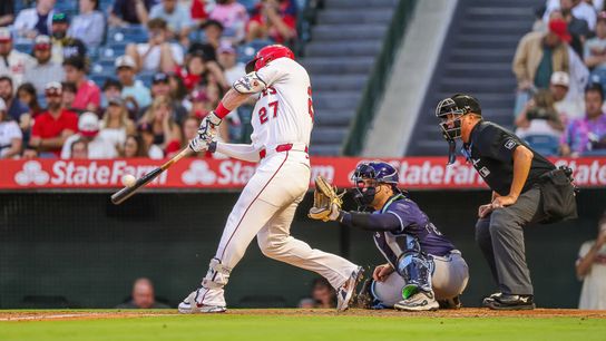 Mike Trout #27 of the Los Angeles Angels get a hit against the Tampa Bay Rays at Angel Stadium of Anaheim on August 4, 2025 in Anaheim, California.
