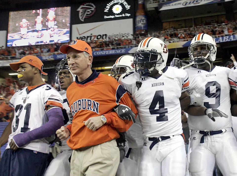 The 2004 Auburn Tigers walk onto the field before the SEC title game. (Grant Halverson/Getty Images)