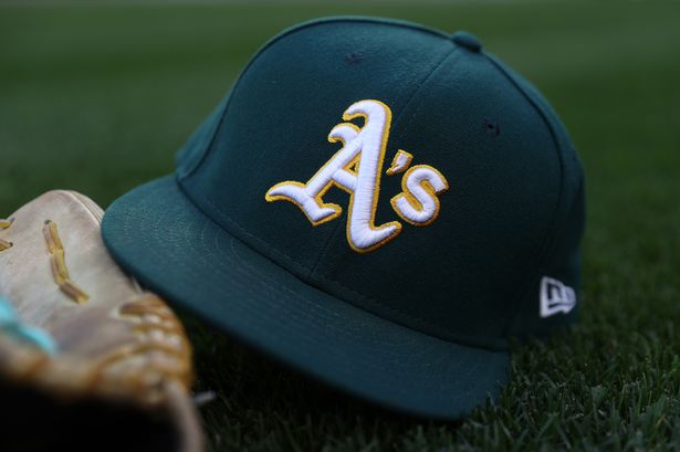 A general view of an Oakland Athletics logo and hat before the game against the Seattle Mariners at T-Mobile Park on September 27, 2024 in Seattle, Washington