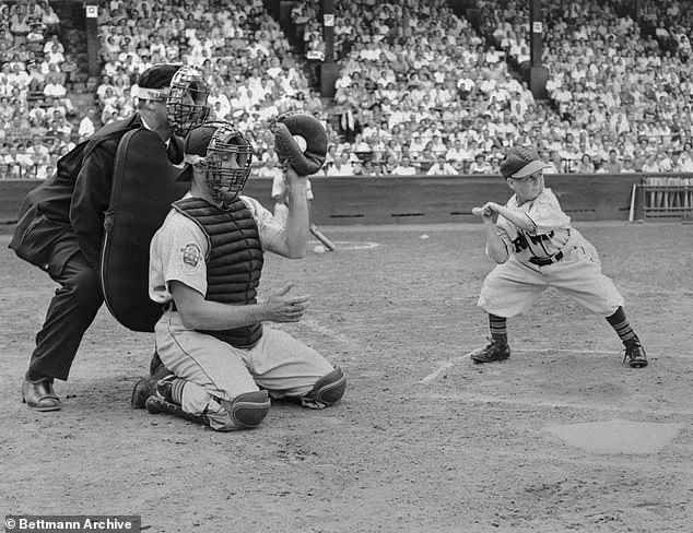 Standing 3-foot-6, Eddie Gaedel was brought in to the St. Louis Browns by Veeck, who warned his 26-year-old rookie not to swing at a pitch or he'd be shot 'between the eyes'