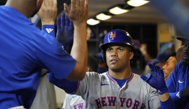 New York Mets outfielder Juan Soto (22) celebrates in the dug out after hitting a home run